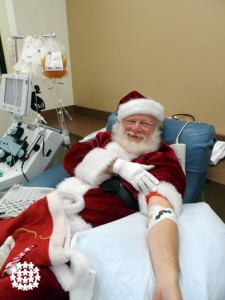 Santa donating blood